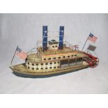 A tin plate American paddle steamer