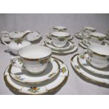 A part tea set of Salon China, including twelve trios, plate and jug.