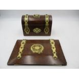 A Victorian stationary box with brass detailing along with a matching blotter