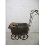 A Hamley's antique pram with paper label to front G & JL, London