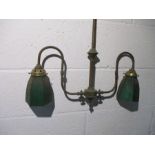 An Edwardian centre light with two green glass shades, converted from gas. Plus four wall lights.