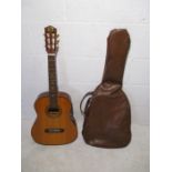 A vintage six string guitar made in Japan, with carry case