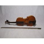 A vintage violin and bow