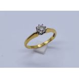An 18ct gold and Platinum diamond solitaire of approximately 0.25ct