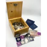 A collection of various worldwide and UK coinage, commemorative crowns, banknotes etc