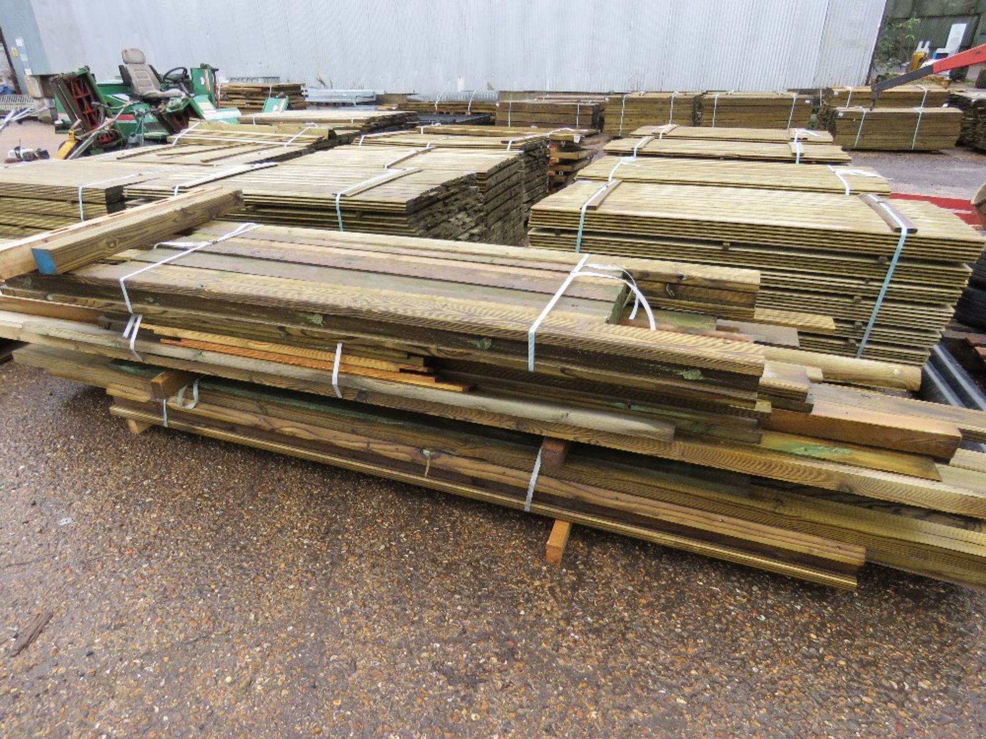 LARGE PACK OF ASSORTED TIMBER POSTS AND FENCING SUPPLIES.