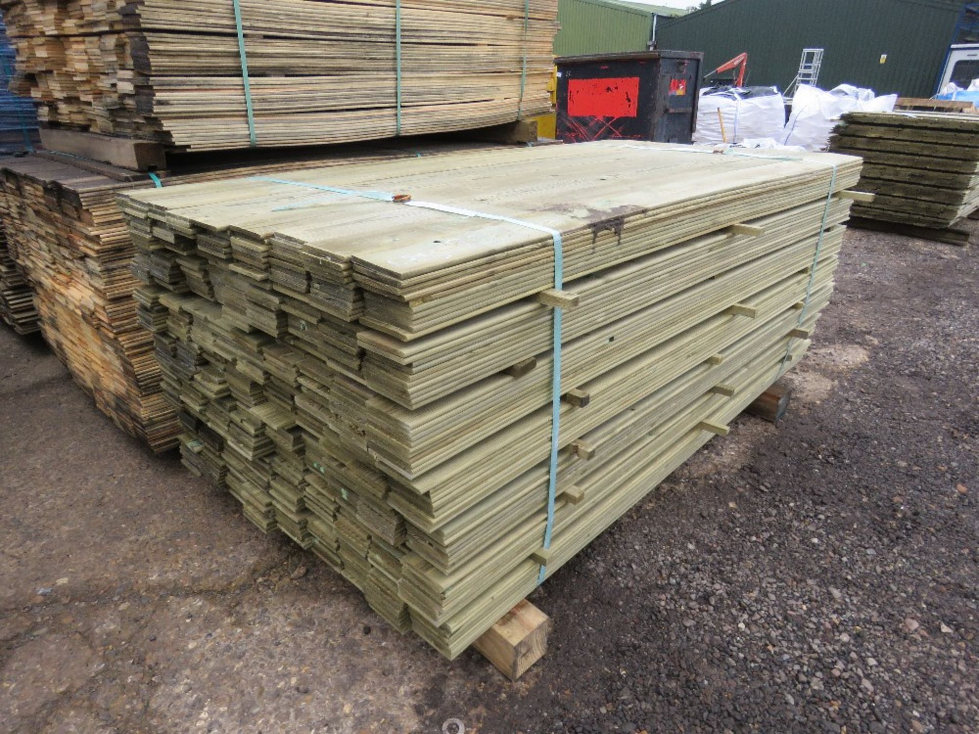 PACK OF TREATED TIMBER CLADDING BOARDS 1.75M X 10CM APPROX.