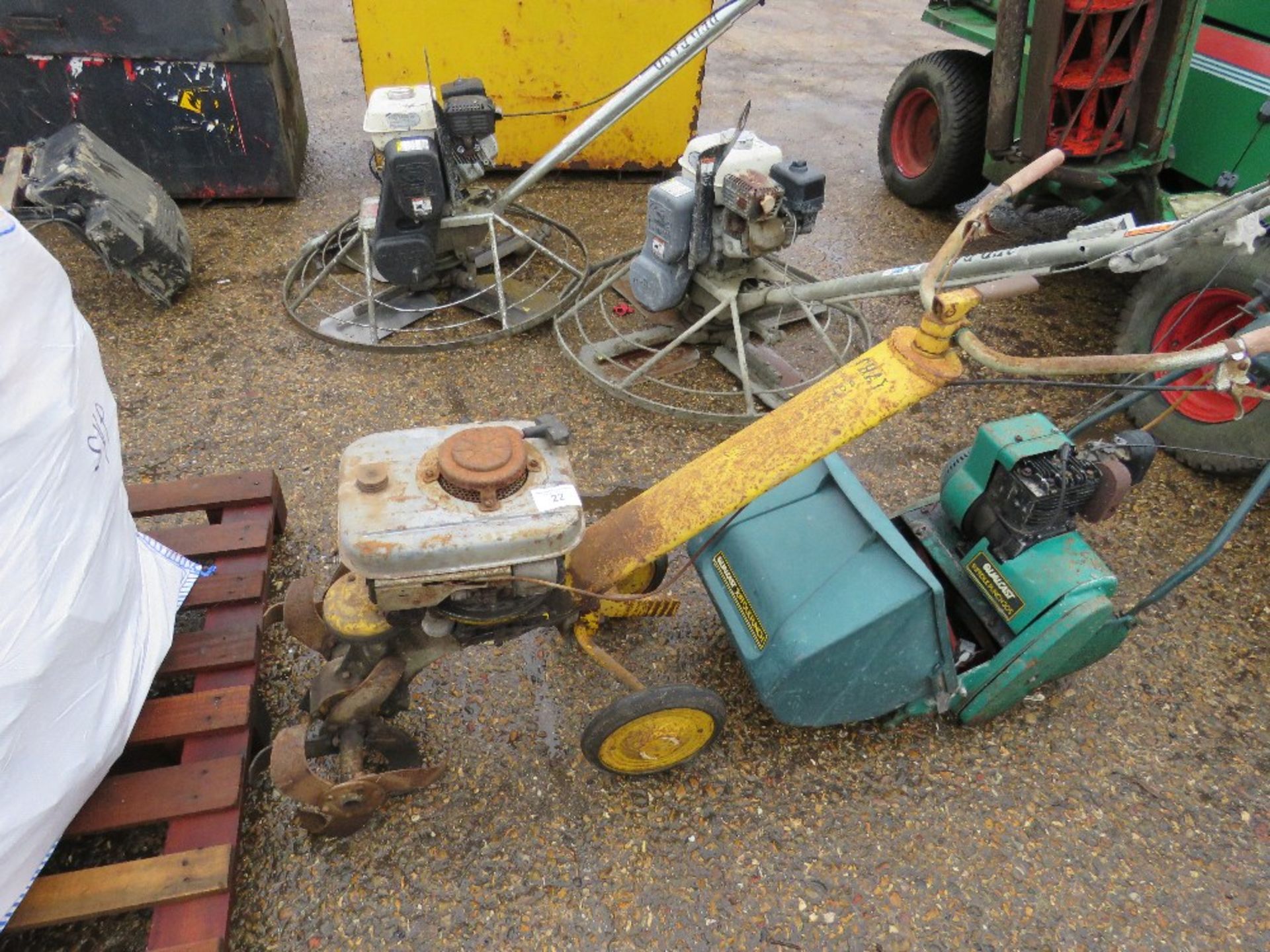 PETROL ROTORVATOR PLUS A CYLINDER MOWER.