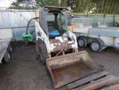 BOBCAT 751 SKIDSTEER LOADER WITH BUCKET AND FORKS. SN:514911037.