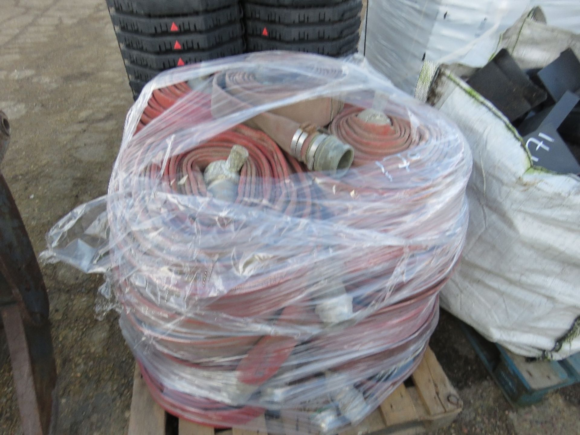 PALLET OF LAYFLAT TYPE FIRE HOSES.