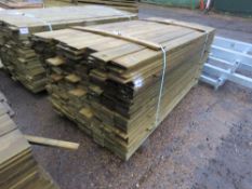 LARGE PACK OF FEATHER EDGE TIMBER FENCE CLADDING. 1.8M LENGTH X 10.5CM WIDTH APPROX.
