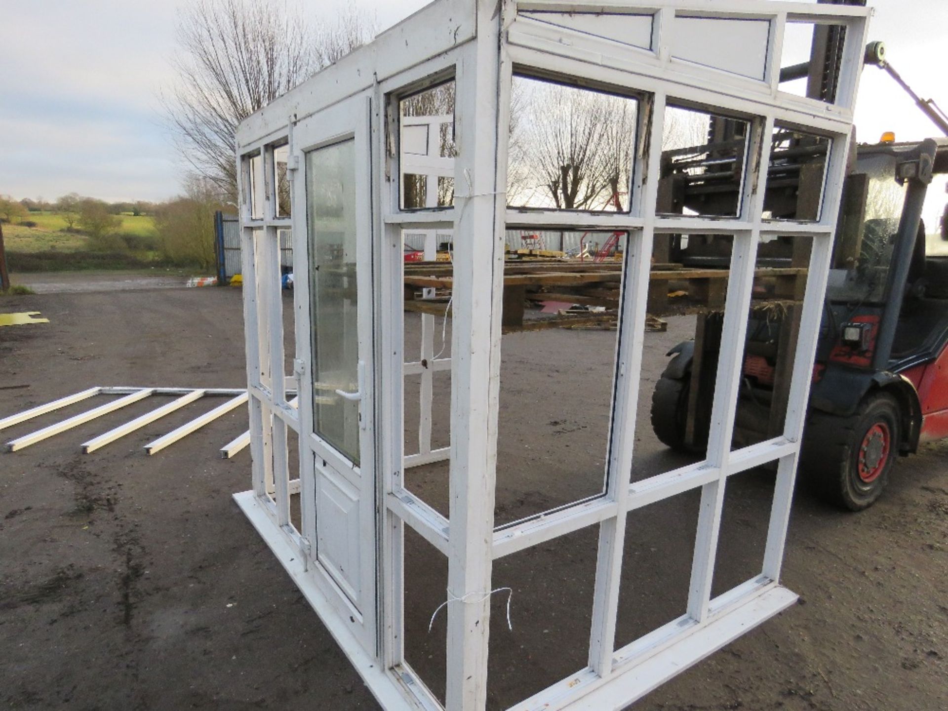 UPVC LEAN TO CONSERVATORY. 1.8M DEPTH X 2.4M WIDTH APPROX. HEIGHT 2.5M - 2.22M APPROX. WITH ONE DOOR
