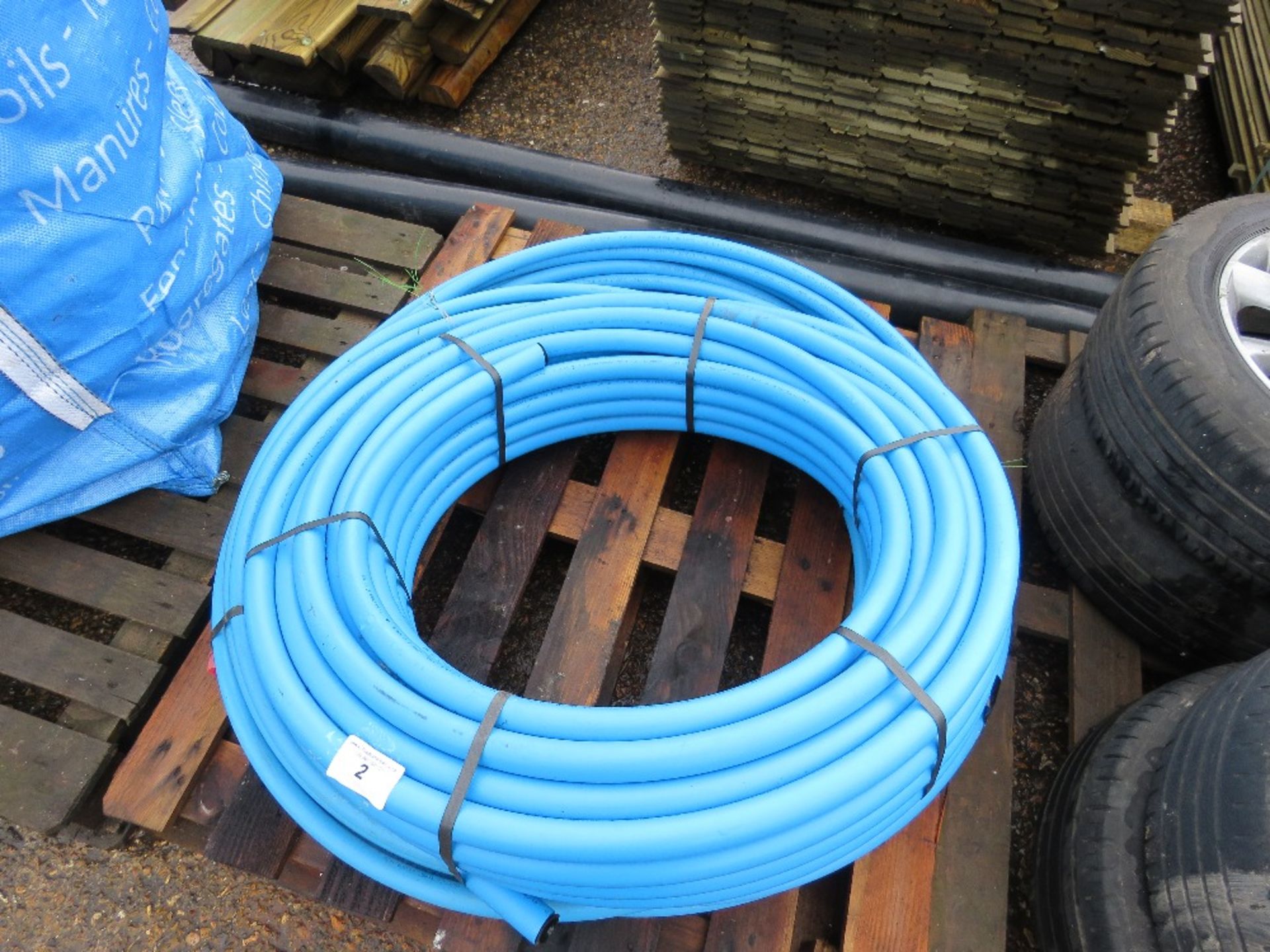 QUANTITY OF BLUE WATER PIPING PLUS 2 X BLACK DRAIN PIPES.