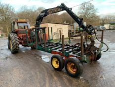 4 WHEELED TIMBER TRAILER WITH CRANAB TIMBER CRANE AND GRAPPLE. WHEN TESTED CRANE WAS SEEN TO LIFT AN