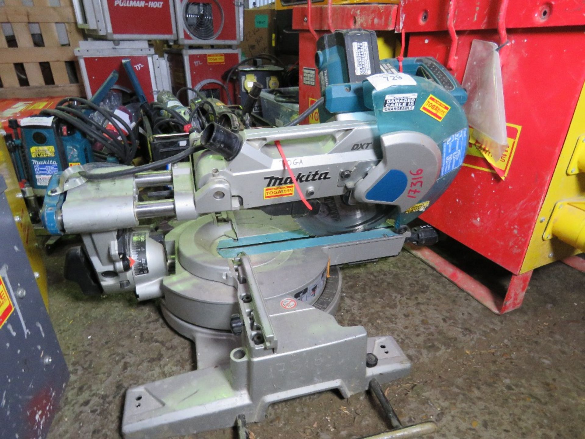 MAKITA 110 VOLT MITRE SAW. UNTESTED, CONDITION UNKNOWN.