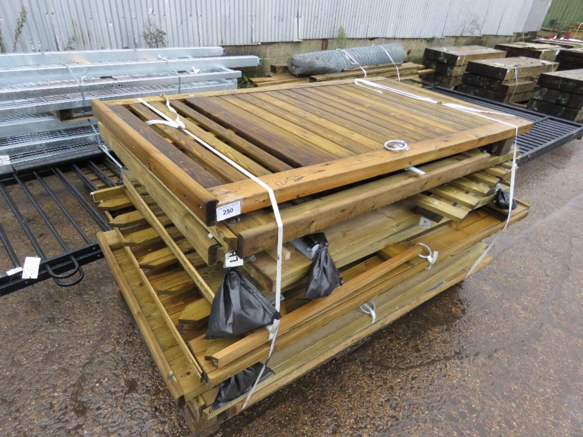 PALLET CONTAINING APPROXIMATELY 12 X WOODEN PEDESTRIAN GATES.