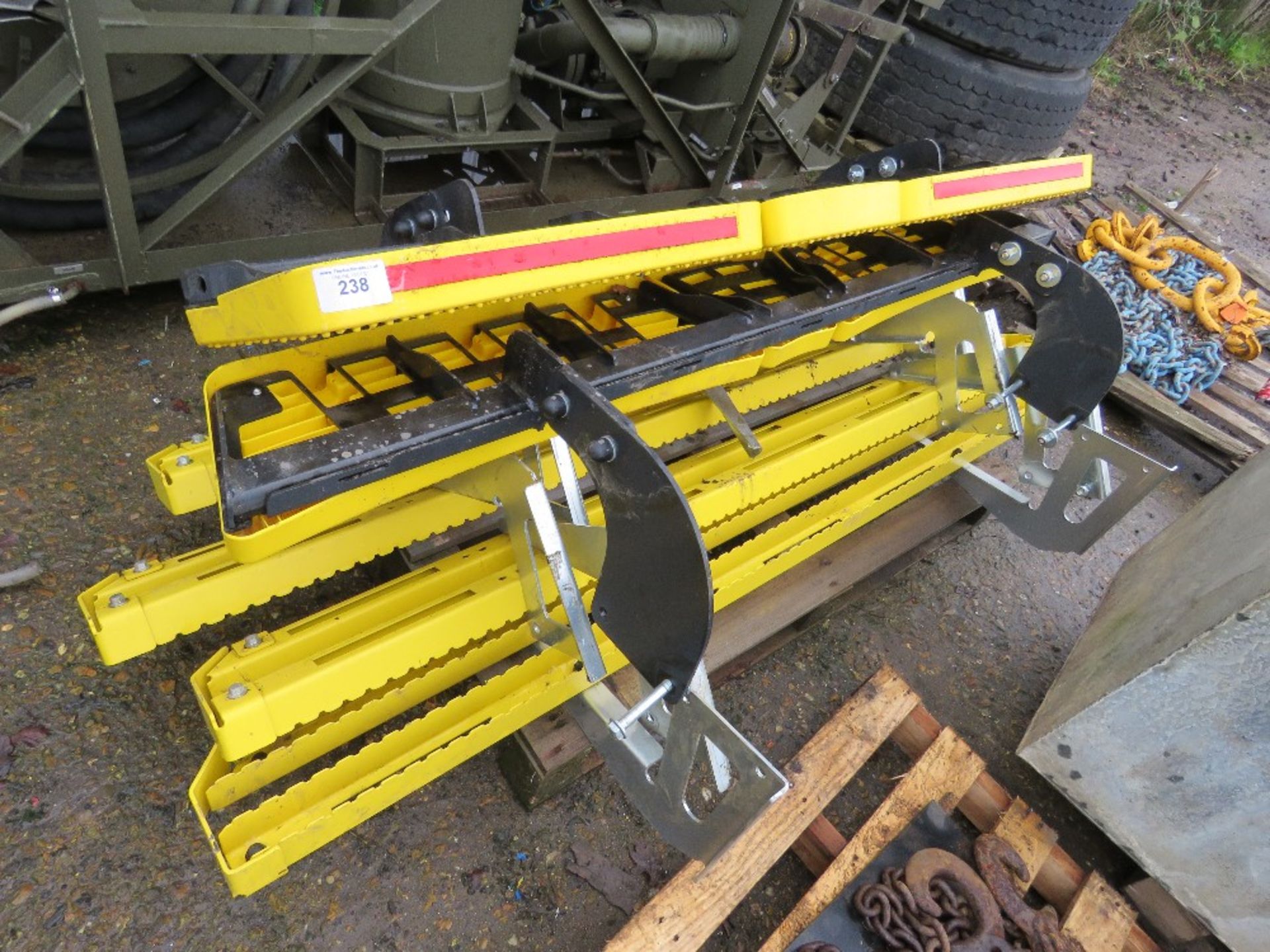 PALLET OF YELLOW REAR VAN STEPS.