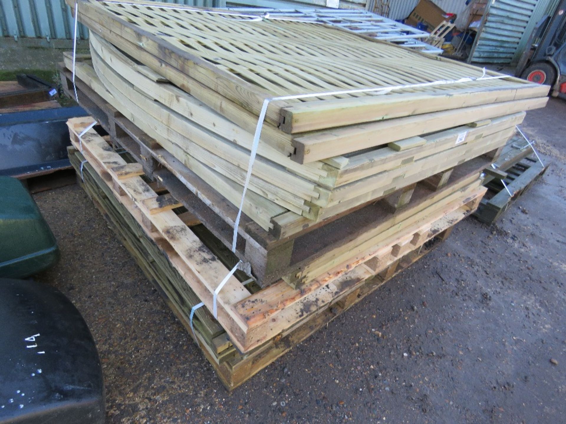 STACK OF 13 X APPROX ASSORTED WOODEN FENCE PANELS.
