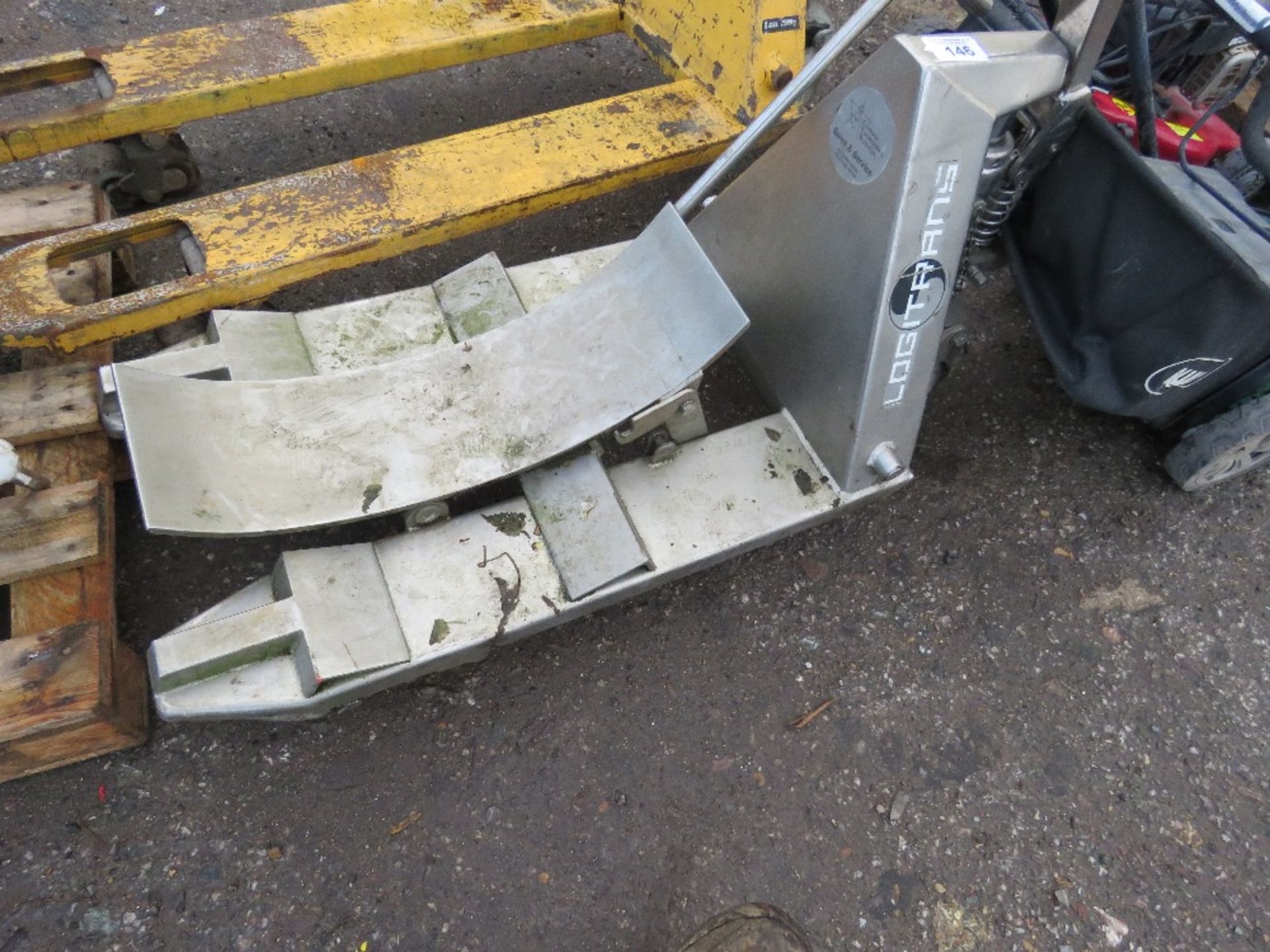 LOGITRANS STAINLESS STEEL BARREL TRUCK. WHEN TESTED WAS SEEN TO LIFT AND LOWER.