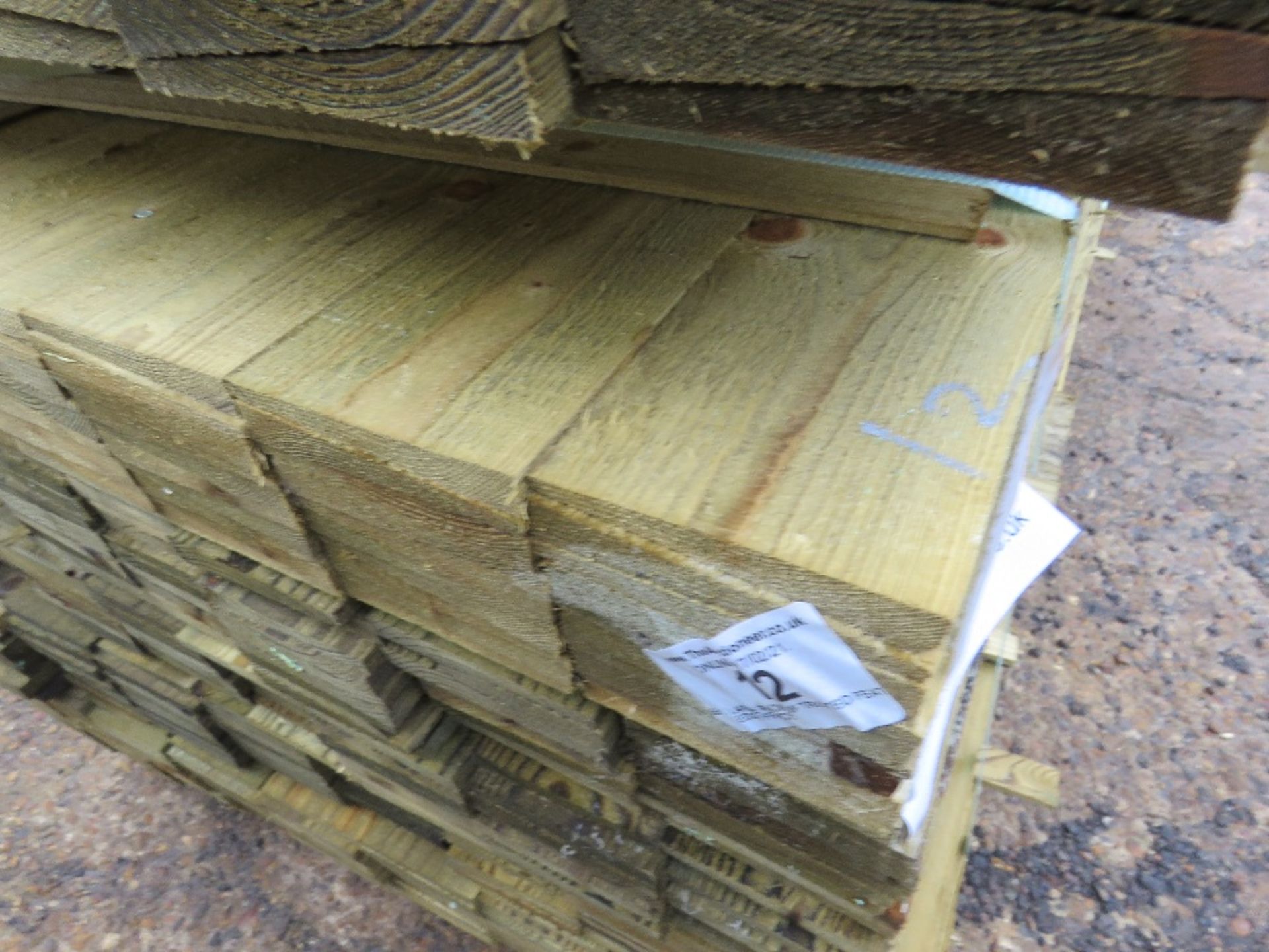 LARGE PACK OF TREATED FEATHER EDGE FENCE CLADDING TIMBERS. 1.8M X 10CM WIDTH APPROX. - Image 4 of 5