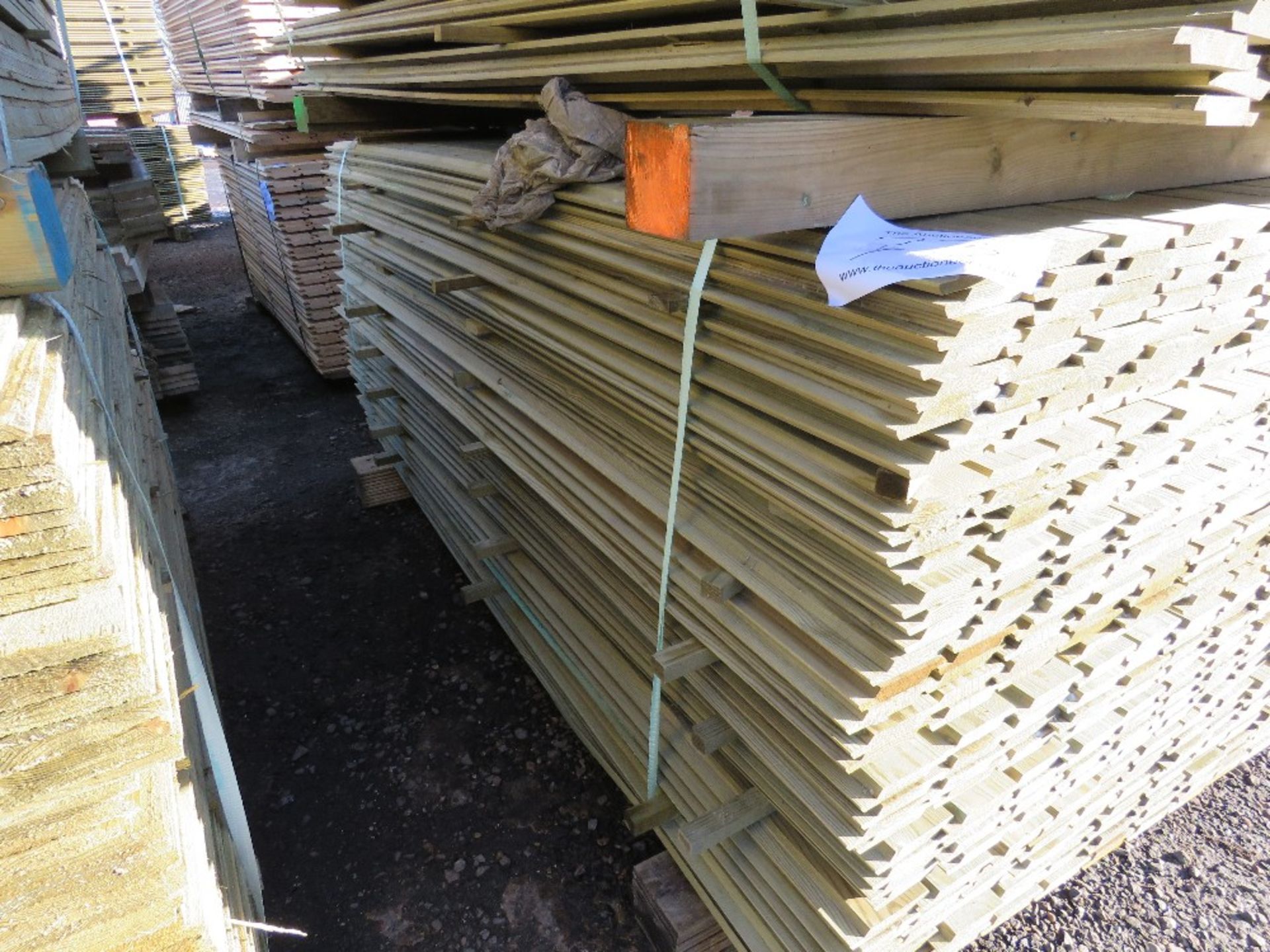 PACK OF TREATED SHIPLAP FENCE CLADDING BOARDS. 1.73M X 10CM APPROX. - Image 2 of 5