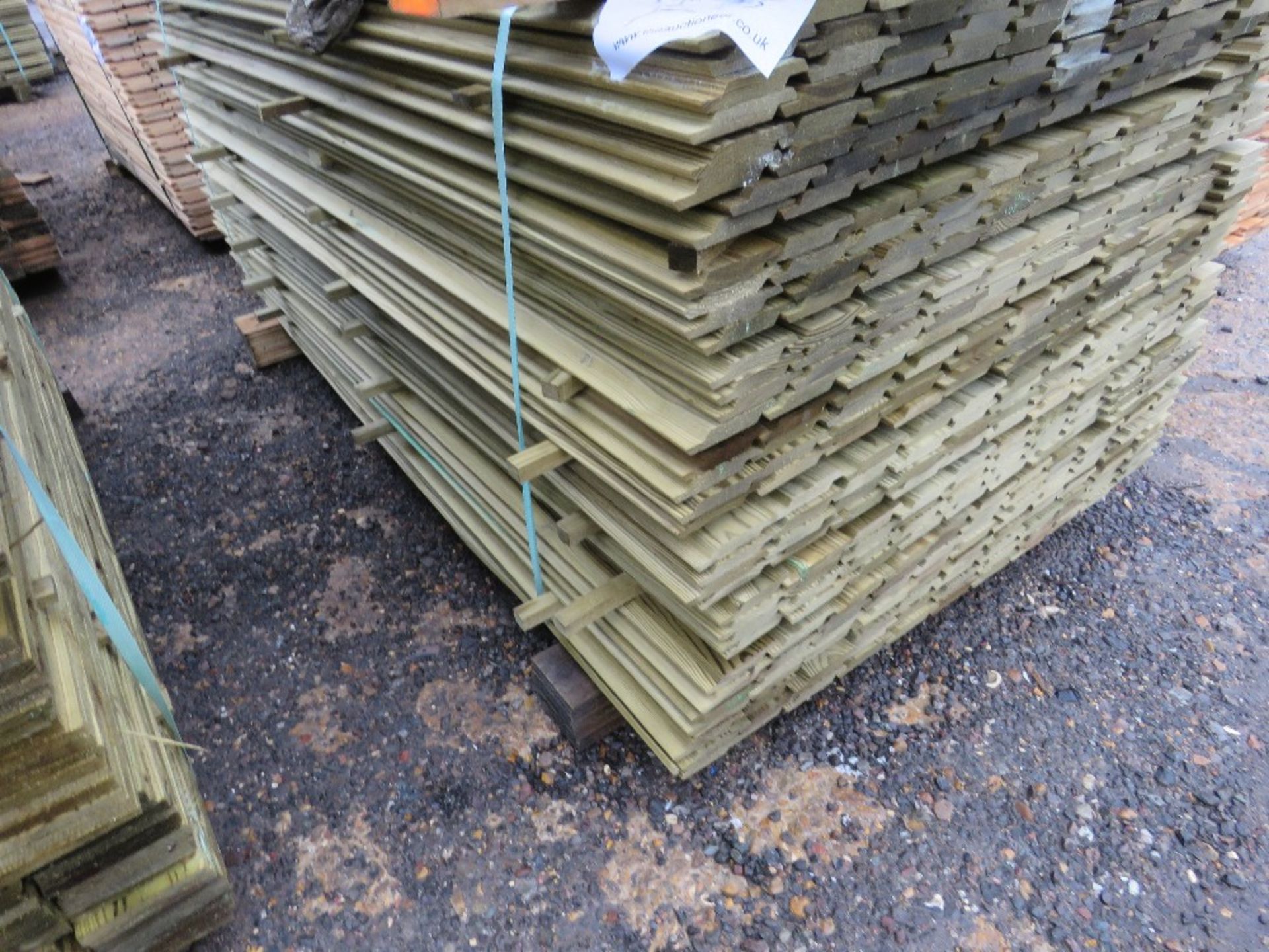 PACK OF TREATED SHIPLAP FENCE CLADDING BOARDS. 1.73M X 10CM APPROX. - Image 3 of 5