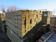 LARGE PACK OF TREATED FEATHER EDGE FENCE CLADDING TIMBERS. 1.8M X 10CM WIDTH APPROX.