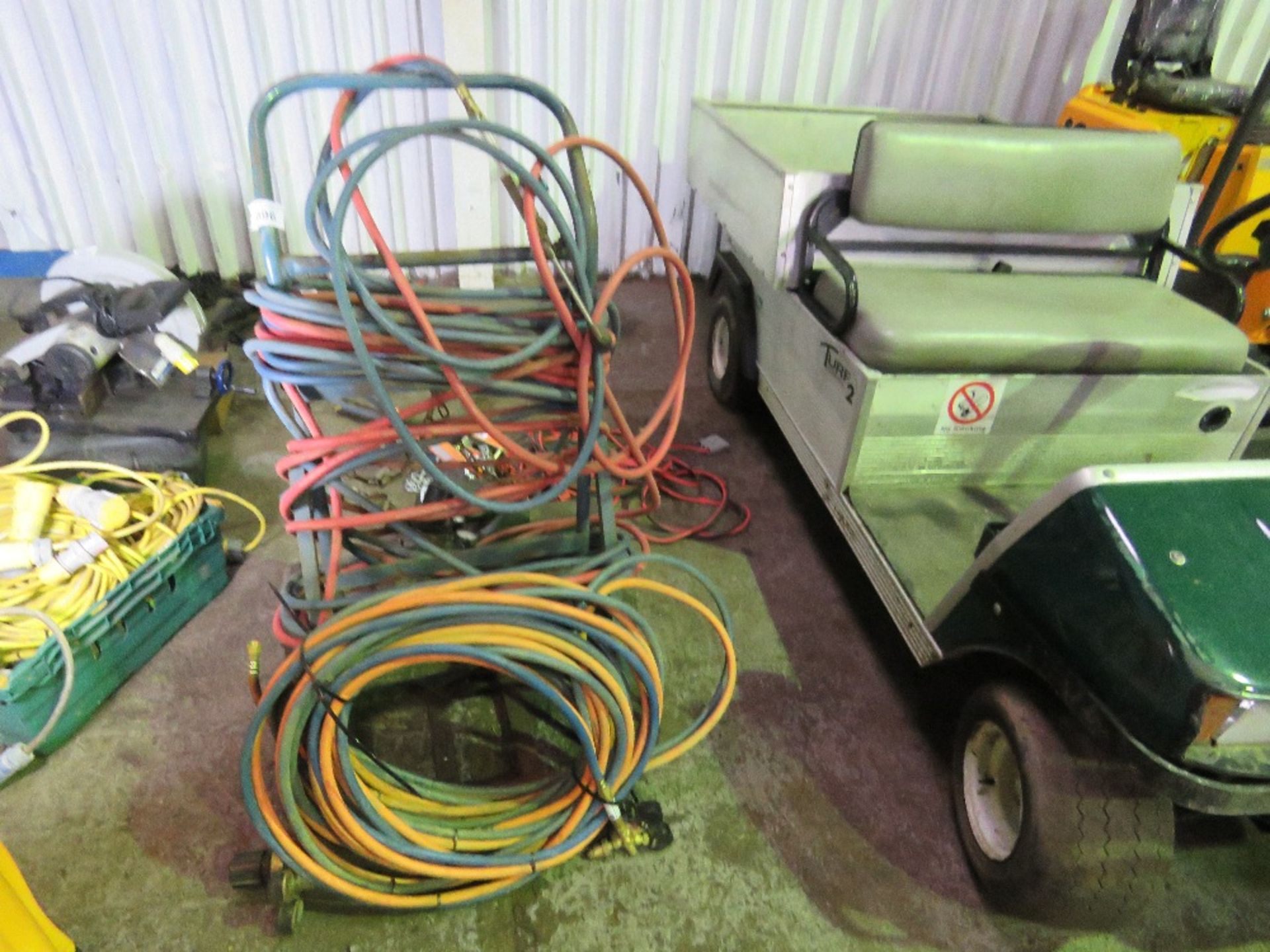 GAS CUTTING HOSES PLUS A TROLLEY AND GUAGES ETC.