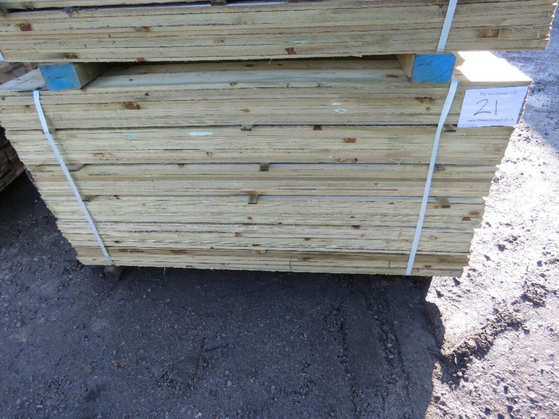 PACK OF TREATED FEATHER EDGE FENCE CLADDING BOARDS. 1.5M X 10CM APPROX. - Image 2 of 5