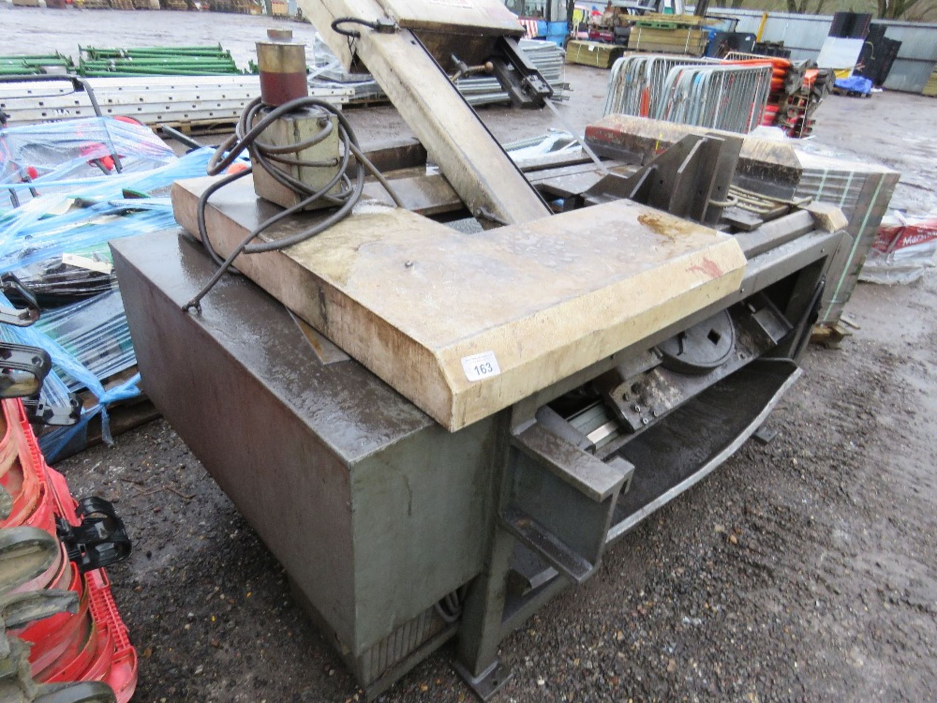 BAUER HYDRAULIC TILTING BANDSAW TABLE.