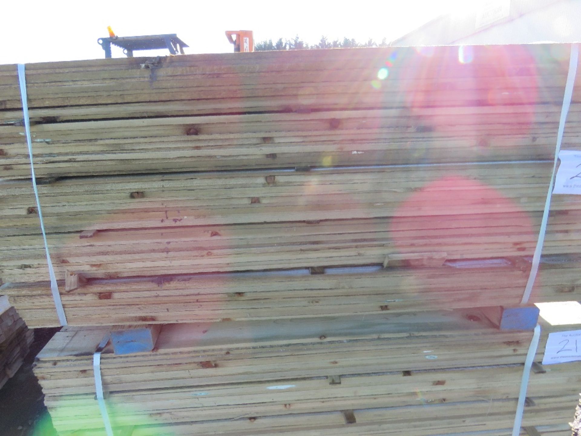 PACK OF TREATED FEATHER EDGE FENCE CLADDING BOARDS. 1.5M X 10CM APPROX. - Image 2 of 5