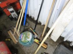 ROLL OF GARDEN HOSE PLUS GARDEN TOOLS.