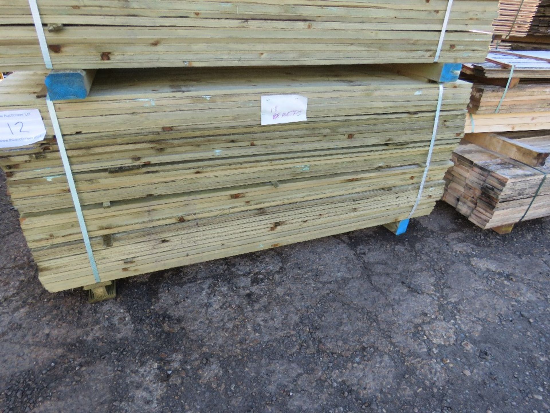 LARGE PACK OF TREATED FEATHER EDGE FENCE CLADDING TIMBERS. 1.8M X 10CM WIDTH APPROX. - Image 2 of 5