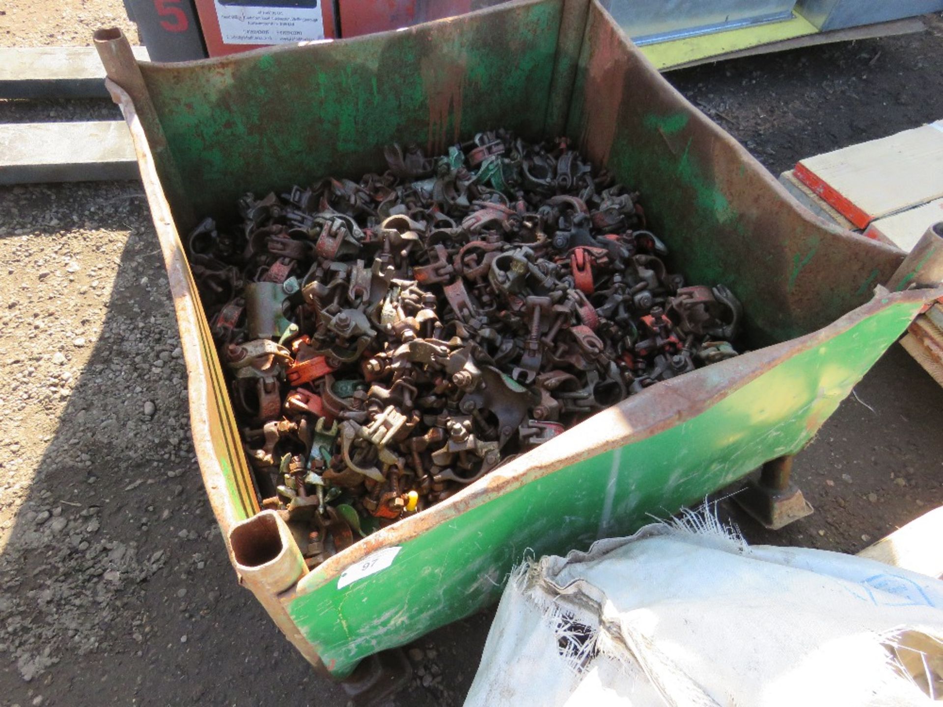 STILLAGE CONTAINING APPROXIMATELY 205 SCAFFOLD CLIPS.