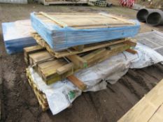 STACK OF MIXED FENCE CLADDING BOARDS ETC.