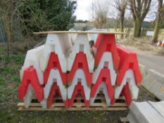 STACK OF 18 X WATER FILLED PLASTIC BARRIER UNITS.