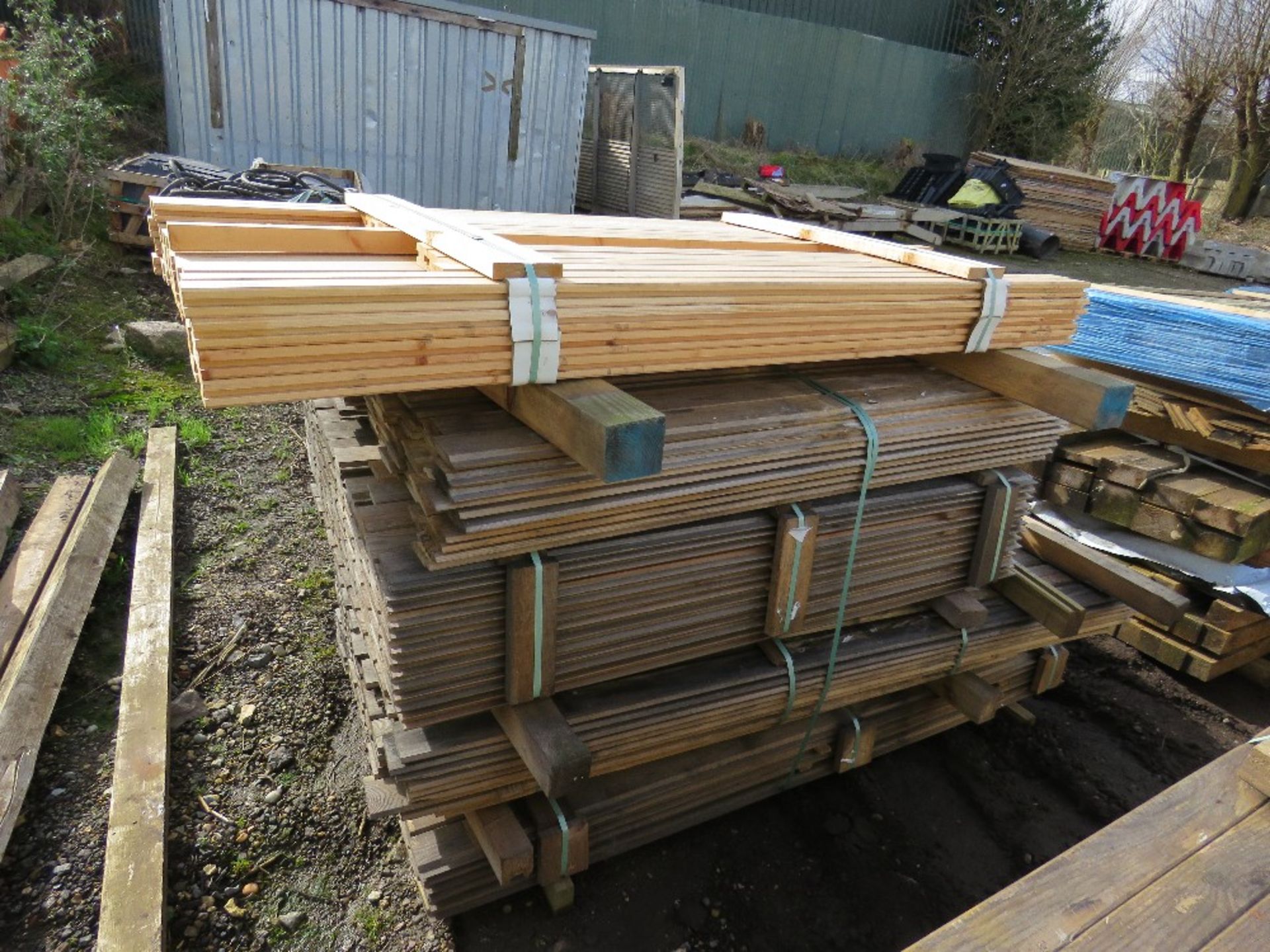 STACK OF SHIPLAP TIMBER CLADDING BOARDS 1.4-1.8M APPROX.