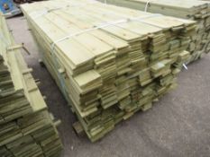 LARGE PACK OF TREATED FEATHER EDGE FENCE CLADDING TIMBER, 1.80M LENGTH X 10CM APPROX.