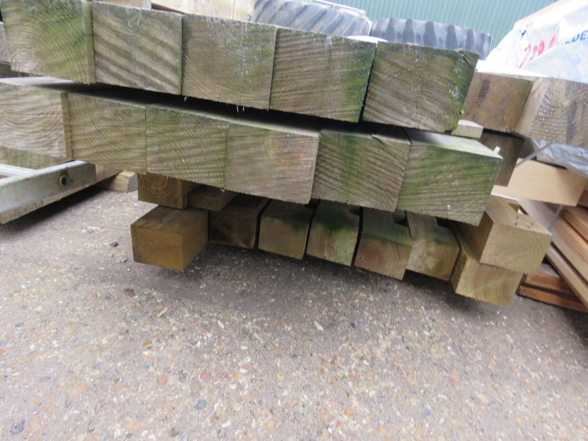 STACK OF NOTCHED FENCE TIMBER POSTS 2.7M - 3.3M LENGTH APPROX. - Image 2 of 2