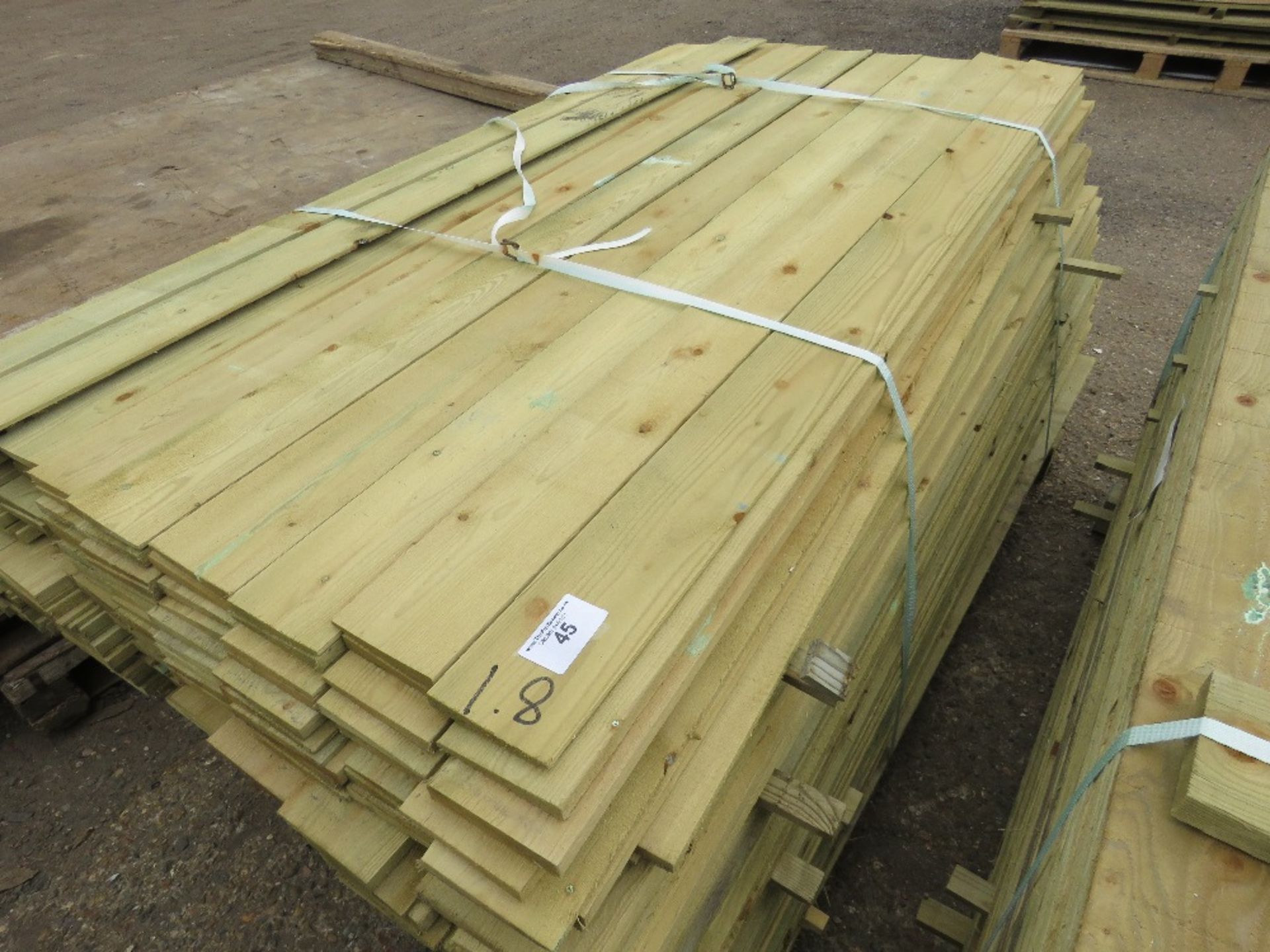 LARGE PACK OF TREATED FEATHER EDGE FENCE CLADDING TIMBER, 1.80M LENGTH X 10CM APPROX.