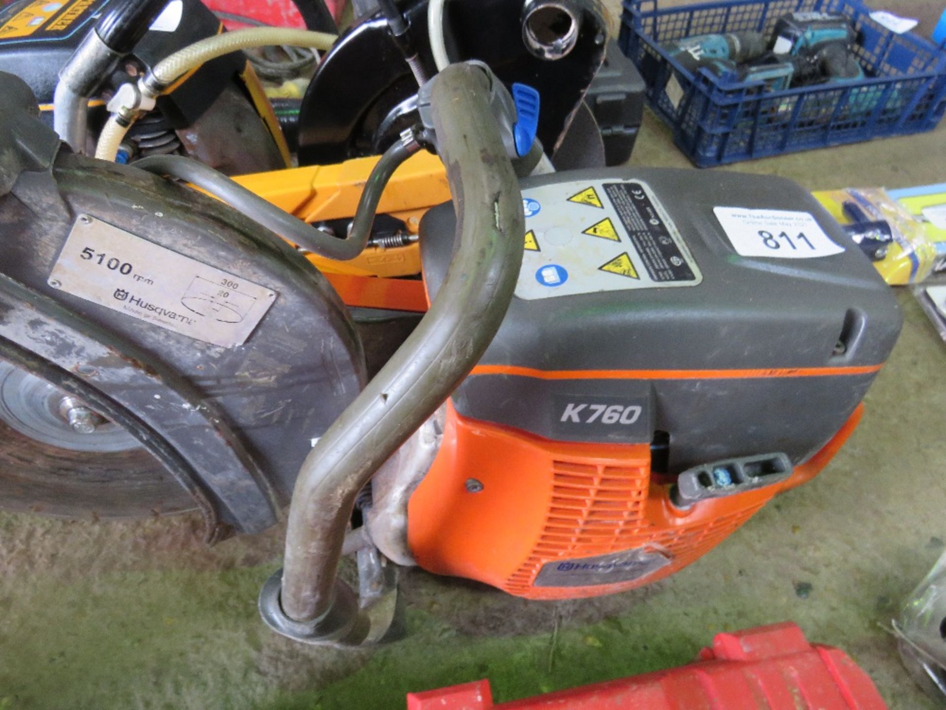 HUSQVARNA K760 PETROL SAW WITH A BLADE.