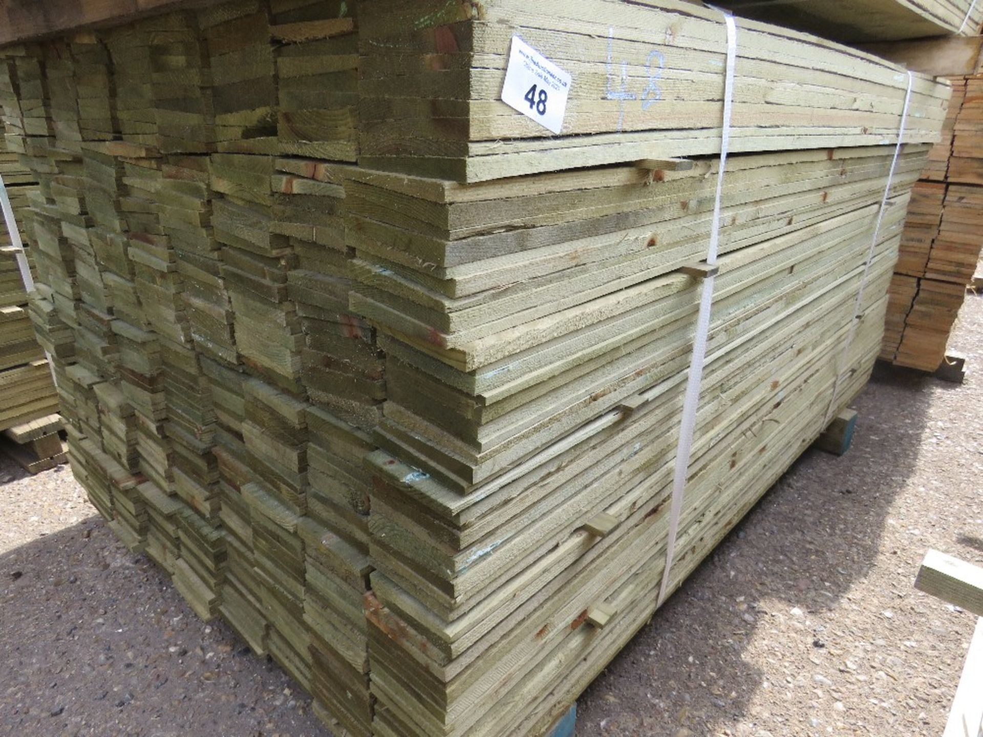 LARGE PACK OF FEATHER EDGE CLADDING TIMBER 1.5M X 10CM APPROX, PRESSURE TREATED.