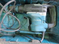 MAKITA 110VOLT MEDIUM SIZED BREAKER DRILL.