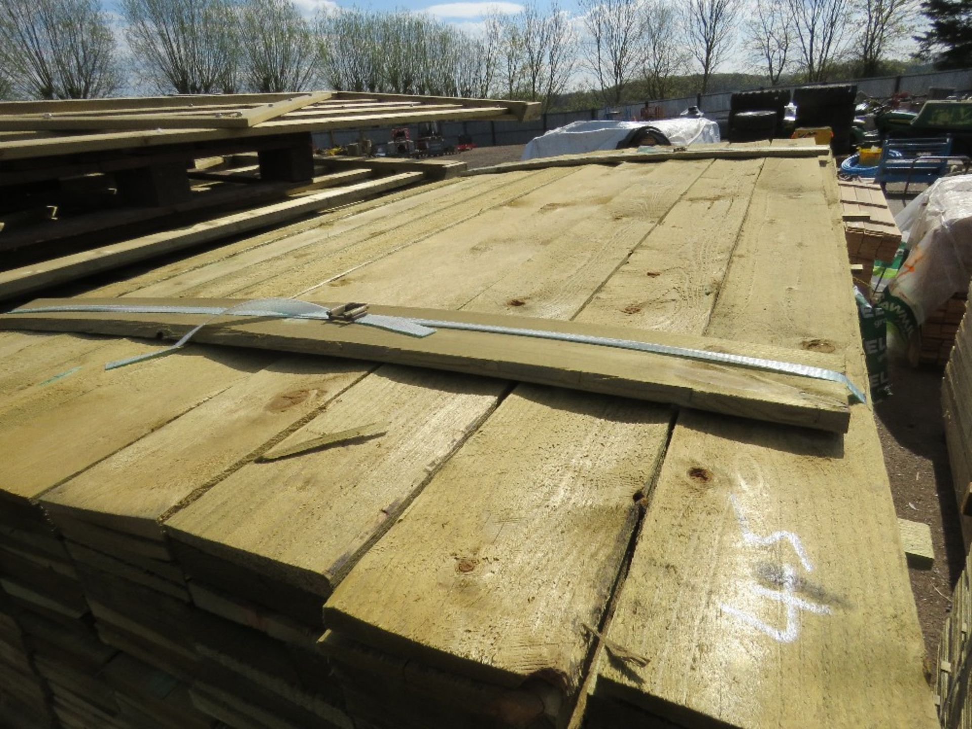 LARGE PACK OF FEATHER EDGE CLADDING TIMBER 1.8M X 10CM APPROX, PRESSURE TREATED. - Image 2 of 3