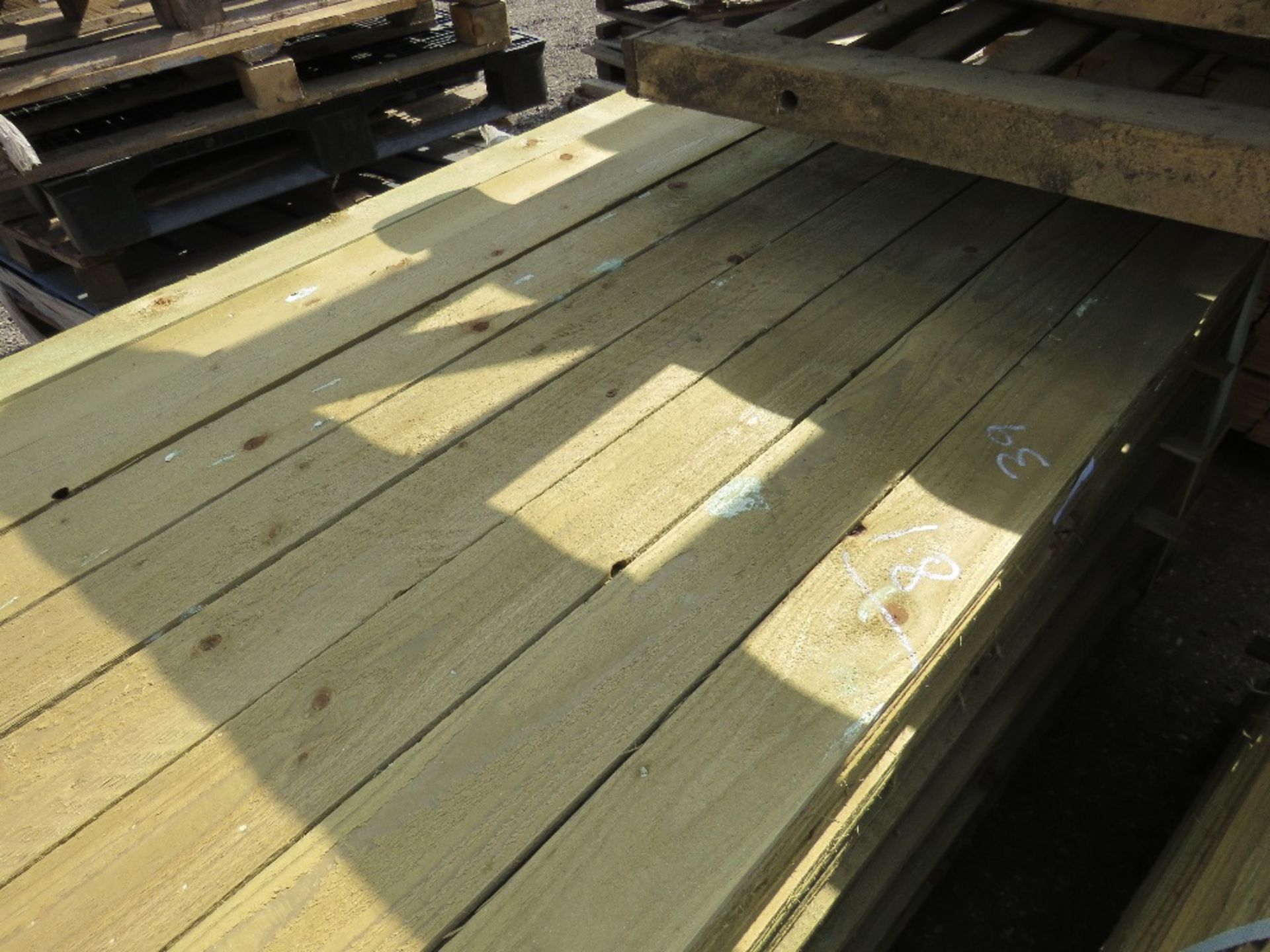 LARGE PACK OF FEATHER EDGE CLADDING TIMBER 1.8M X 10CM APPROX, PRESSURE TREATED. - Image 3 of 4