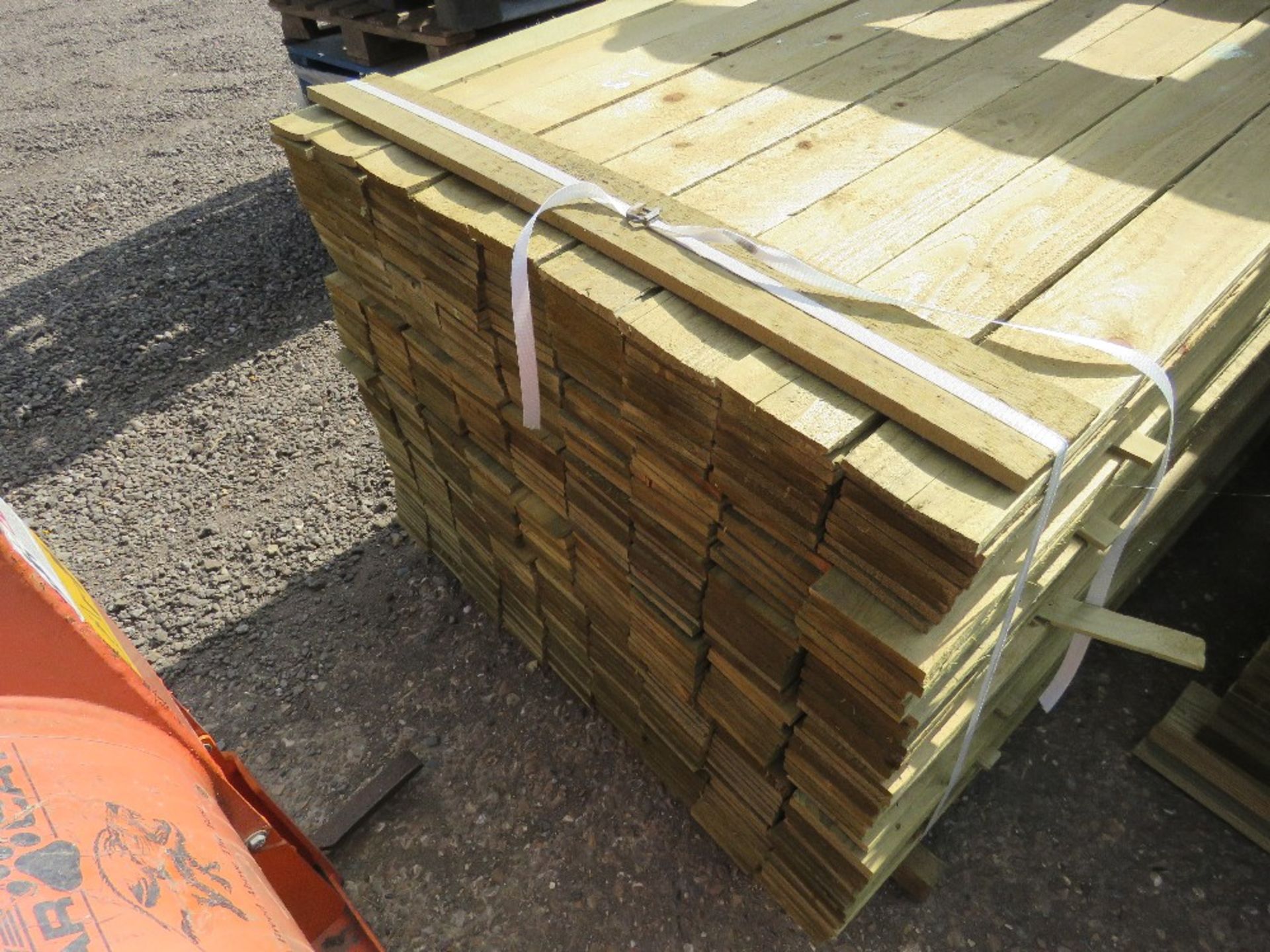 LARGE PACK OF FEATHER EDGE CLADDING TIMBER 1.8M X 10CM APPROX, PRESSURE TREATED. - Image 2 of 4