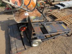 2 X UPRIGHT BREAKER TROLLEYS PLUS A WHEELBARROW.