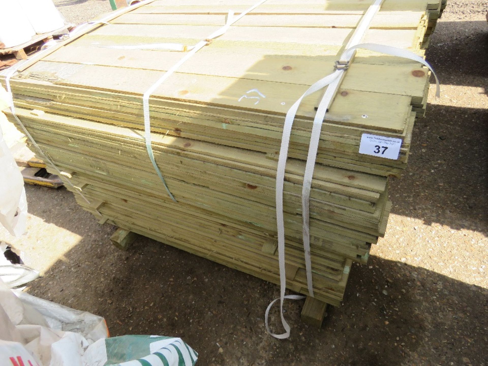 LARGE PACK OF FEATHER EDGE CLADDING TIMBER 1.2M X 10CM APPROX, PRESSURE TREATED.