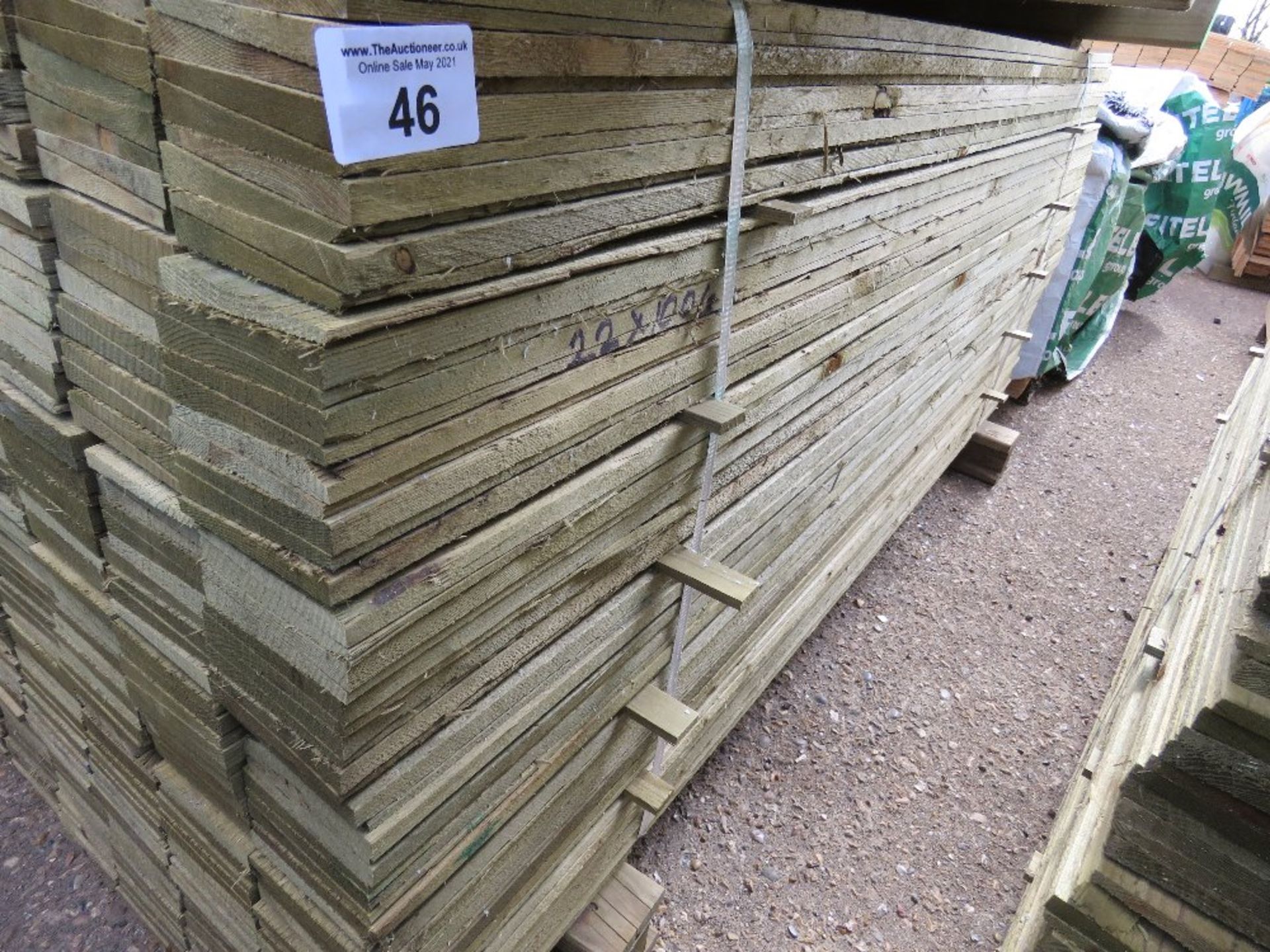 LARGE PACK OF FEATHER EDGE CLADDING TIMBER 1.8M X 10CM APPROX, PRESSURE TREATED.