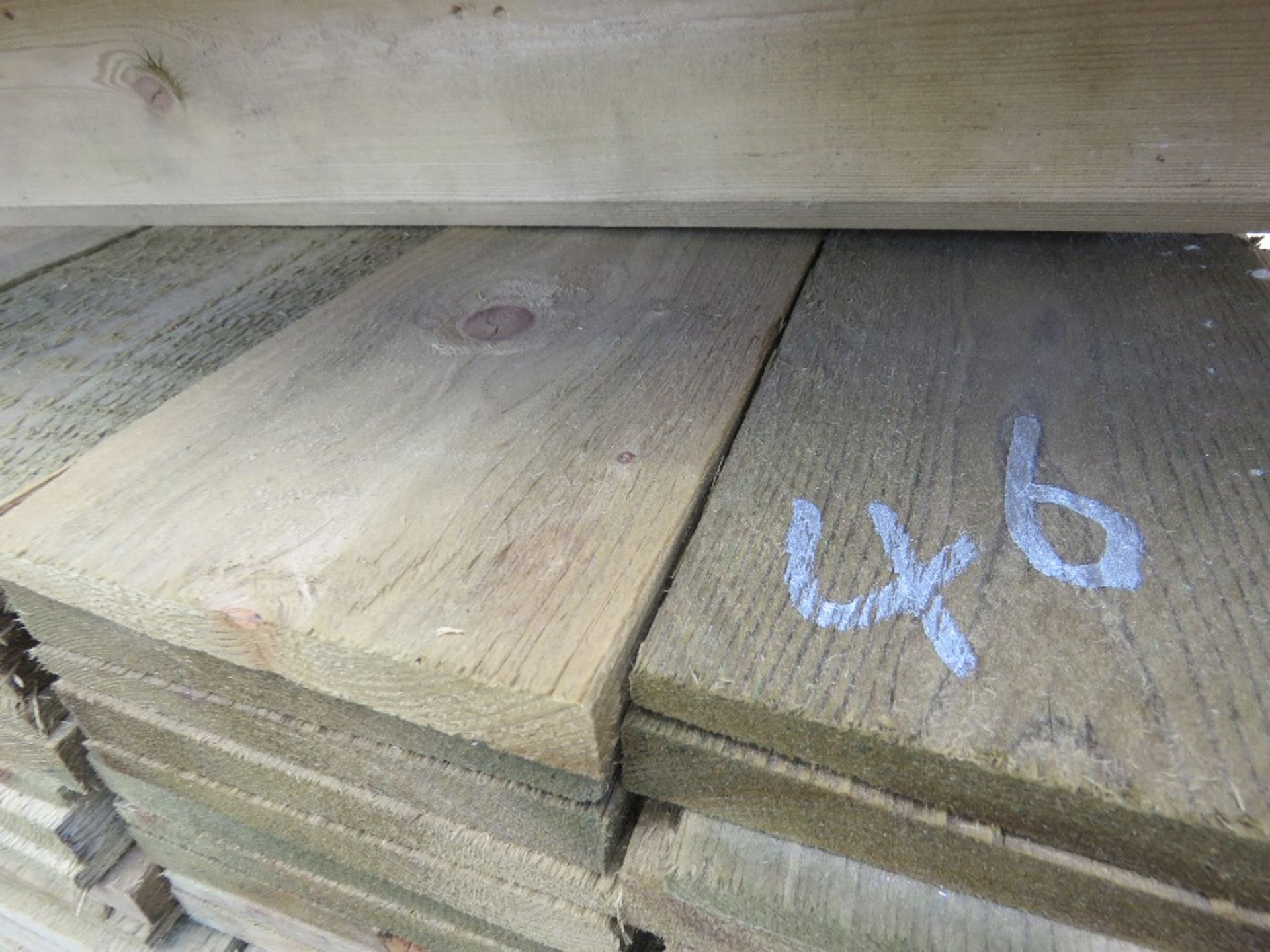 LARGE PACK OF FEATHER EDGE CLADDING TIMBER 1.8M X 10CM APPROX, PRESSURE TREATED. - Image 3 of 3
